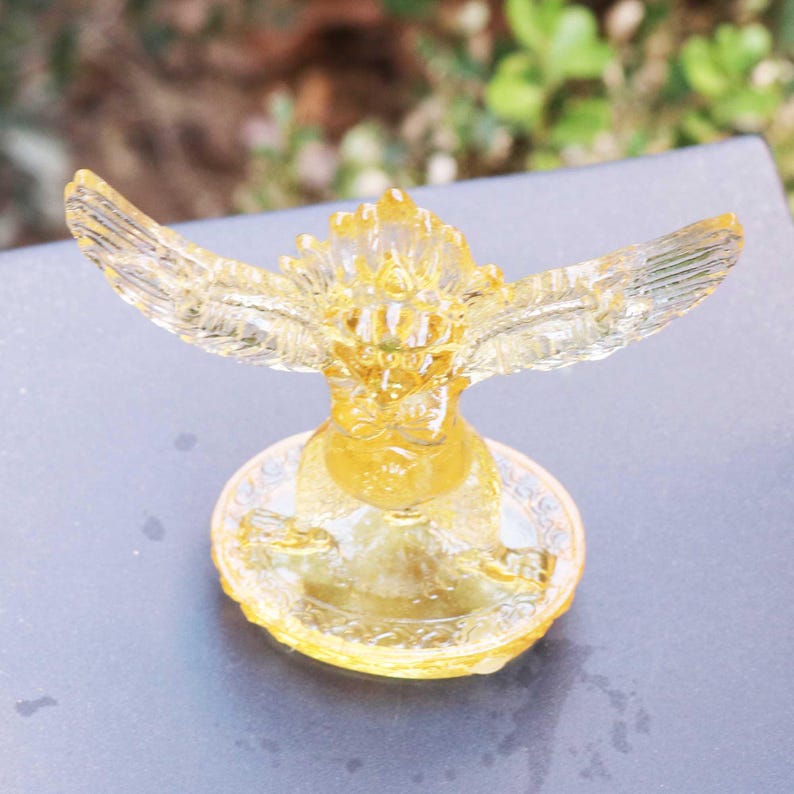 Glass Garuda Buddha Statue: Amber Tibetan Ornament