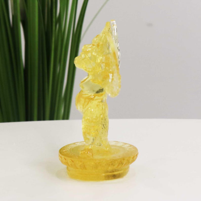 Glass Garuda Buddha Statue: Amber Tibetan Ornament