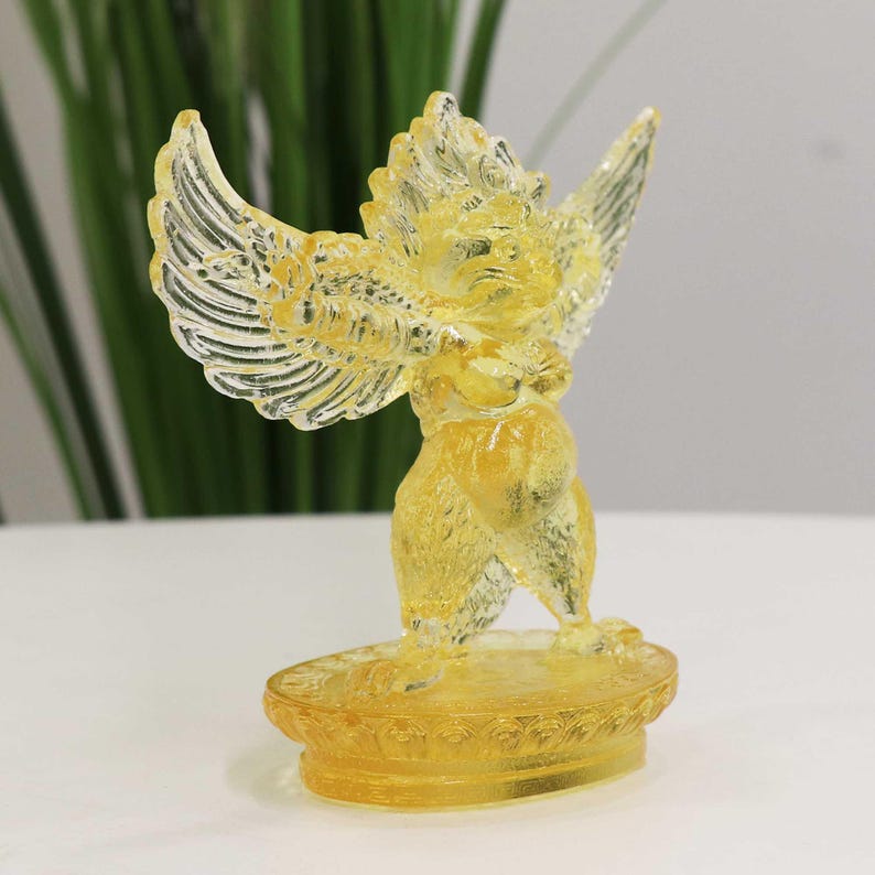 Glass Garuda Buddha Statue: Amber Tibetan Ornament