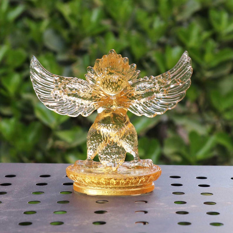 Glass Garuda Buddha Statue: Amber Tibetan Ornament