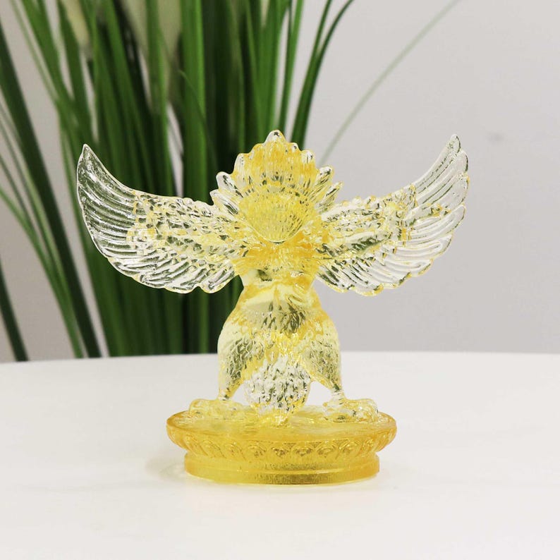 Glass Garuda Buddha Statue: Amber Tibetan Ornament
